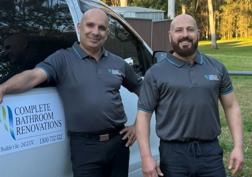Some of the Complete Bathroom Renovations team standing outside a client's home, ready to start a bathroom renovation project.